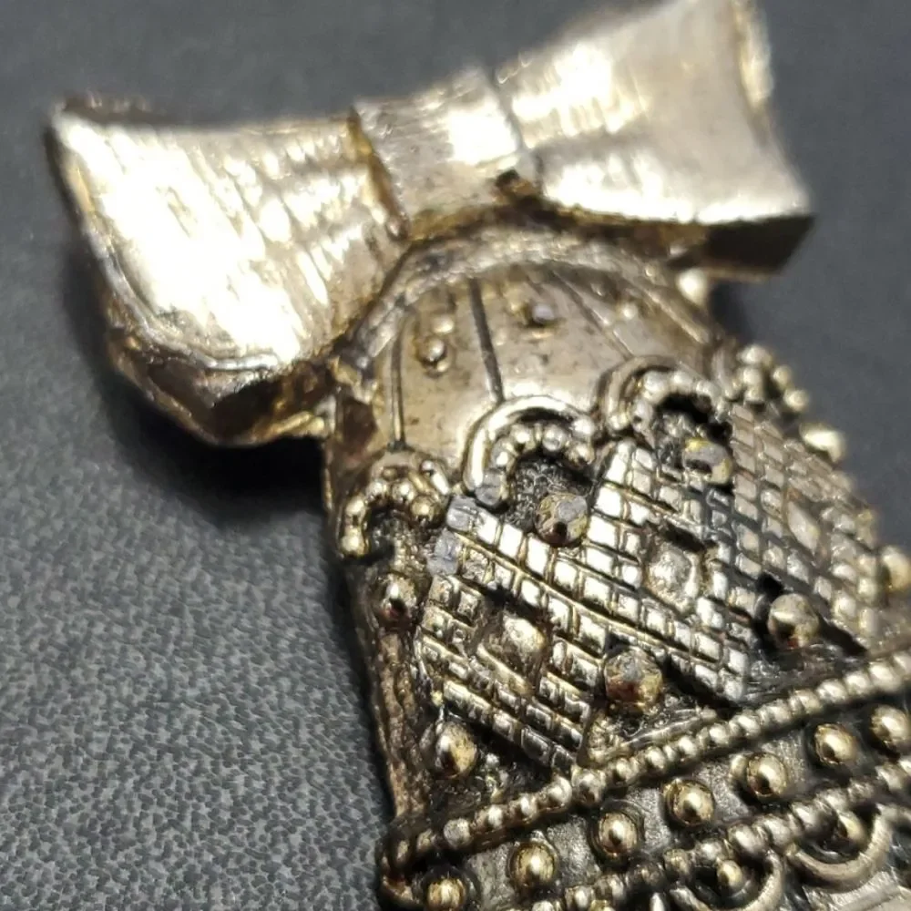 Vintage gold tone bell brooch